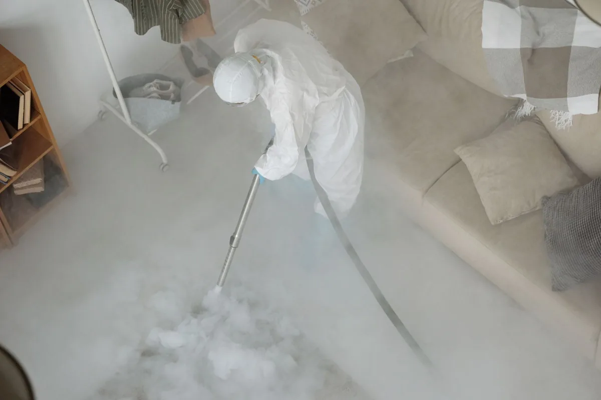 Biohazard cleanup technician in protective equipment, East Vineland, NJ